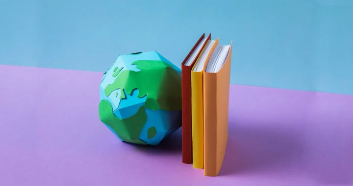 earth model next to documents