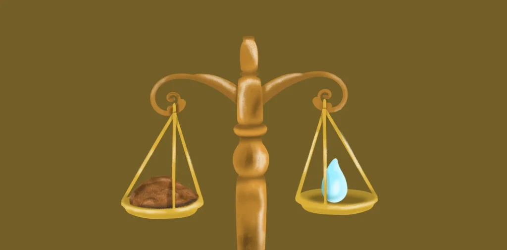 timbangan berisikan tanah dan air