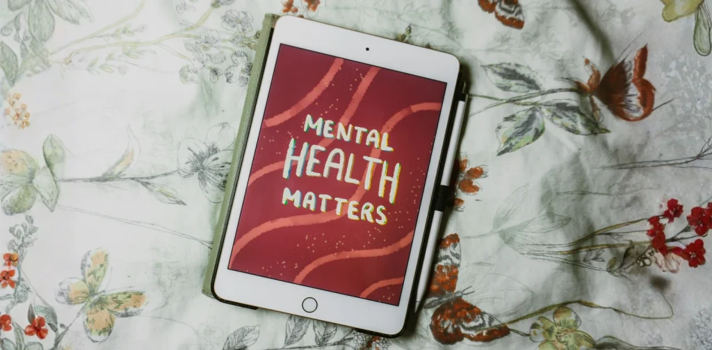 layar gadget dengan tulisan mental health matters